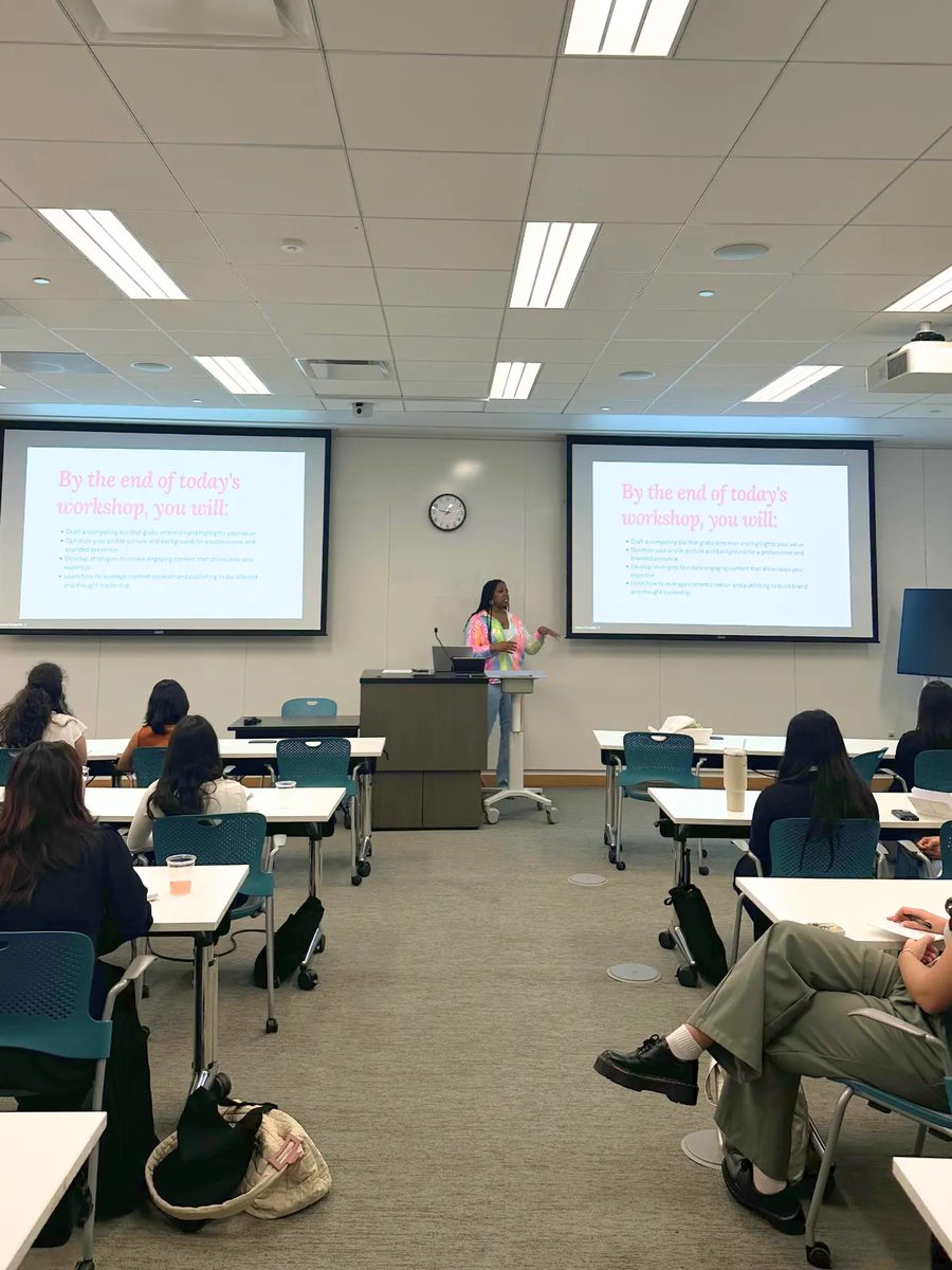 Adebukola Ajao teaching a marketing workshop in front of a full classroom