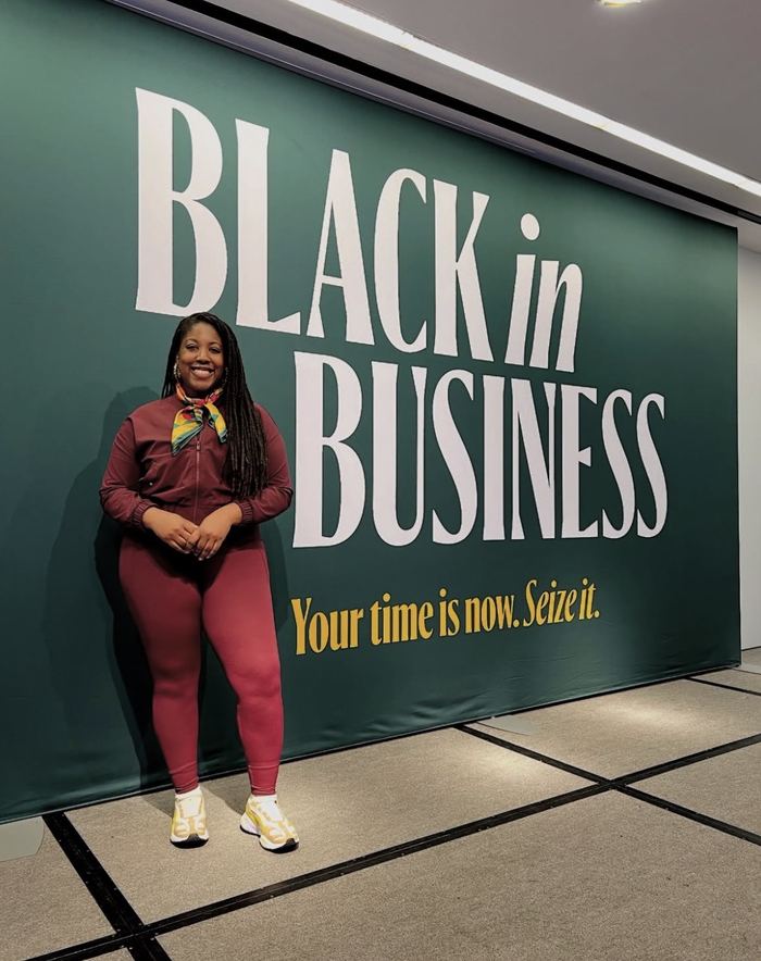 Adebukola Ajao in front of a Black in Business backdrop