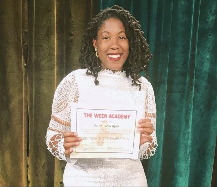 Adebukola Ajao holding her WEEN Academy certificate of completion